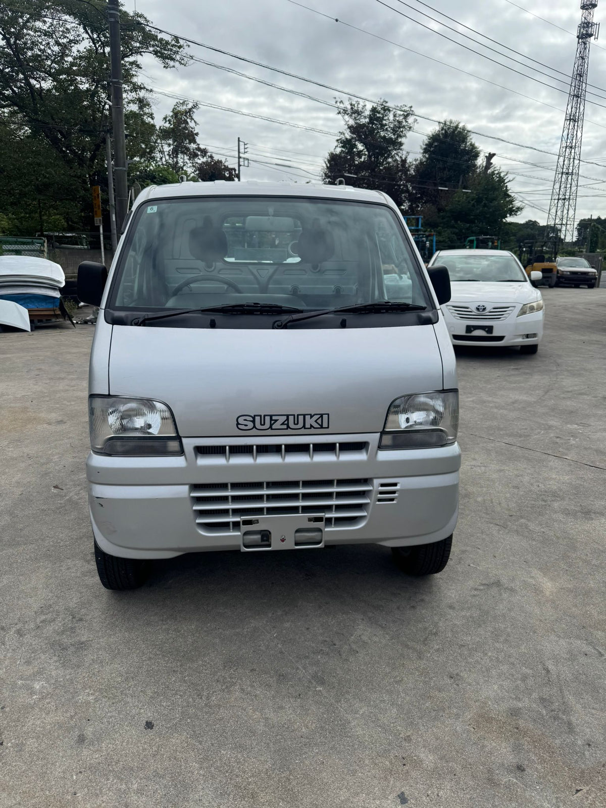 Silver 2001 Suzuki Carry 4x4 kei truck