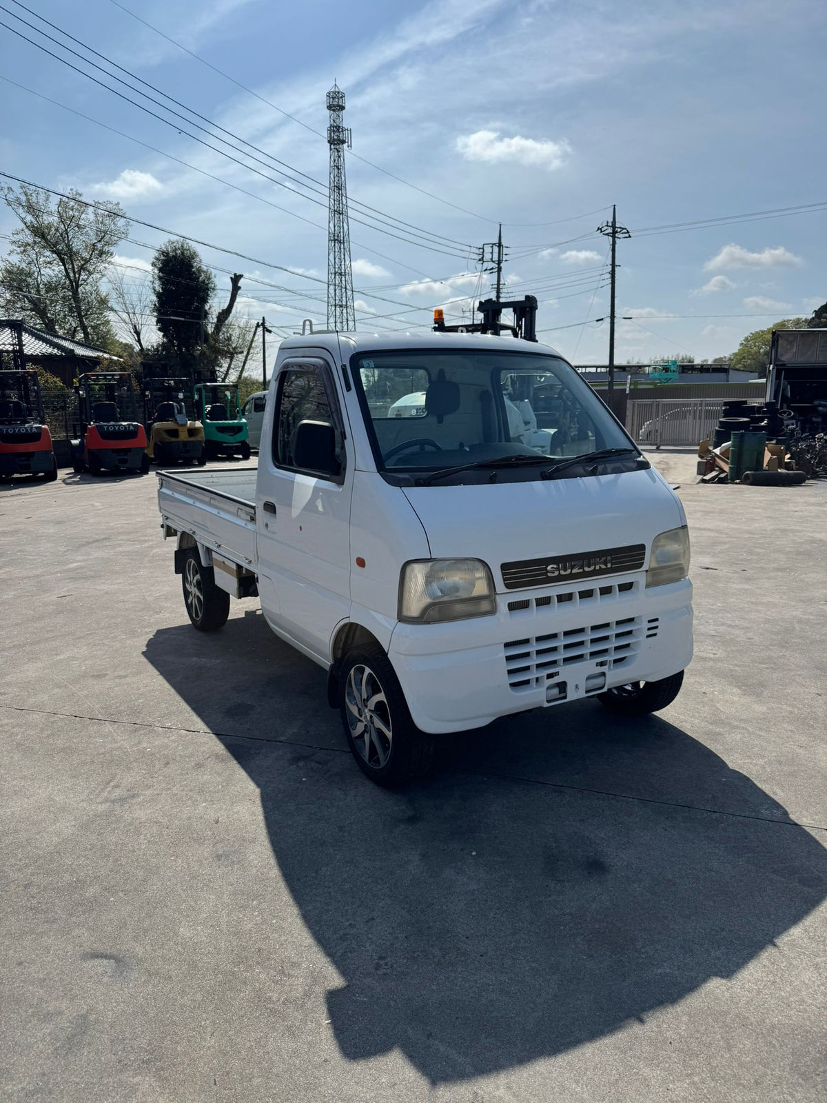 White 2001 Suzuki Carry 4x4 kei truck, photo 1 of 12