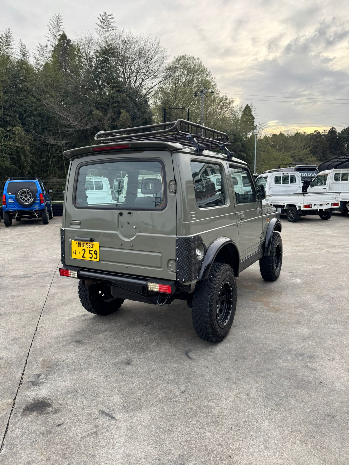 Green 1997 Suzuki Jimny 4x4 kei SUV, photo 1 of 17
