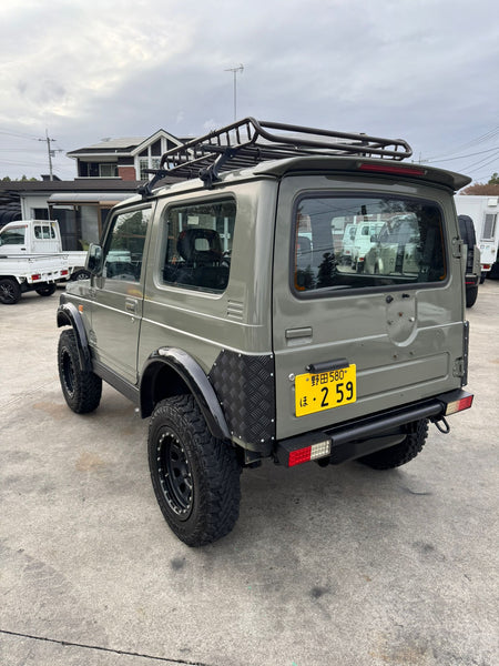 Green 1997 Suzuki Jimny 4x4 kei SUV, photo 2 of 17