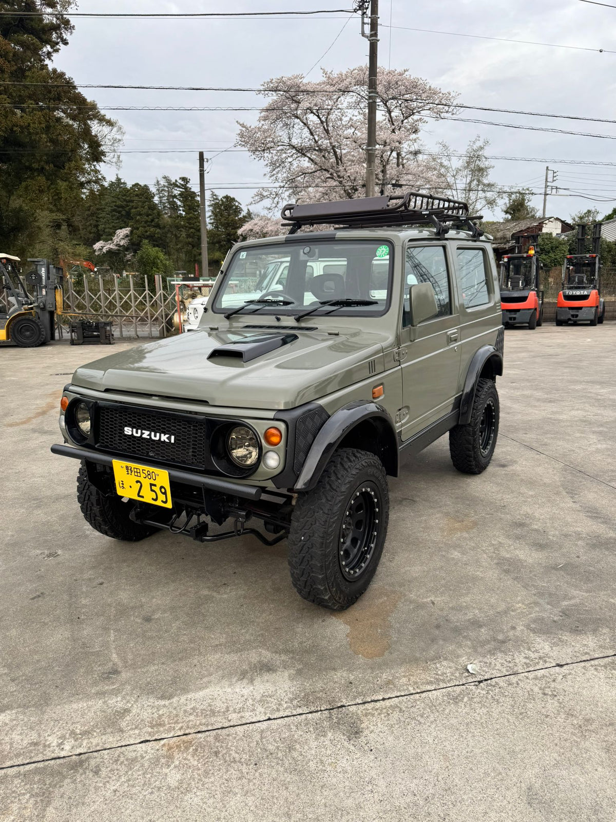 Green 1997 Suzuki Jimny 4x4 kei SUV, photo 4 of 17