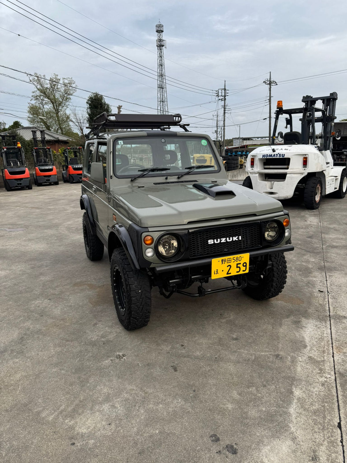 Green 1997 Suzuki Jimny 4x4 kei SUV, photo 5 of 17