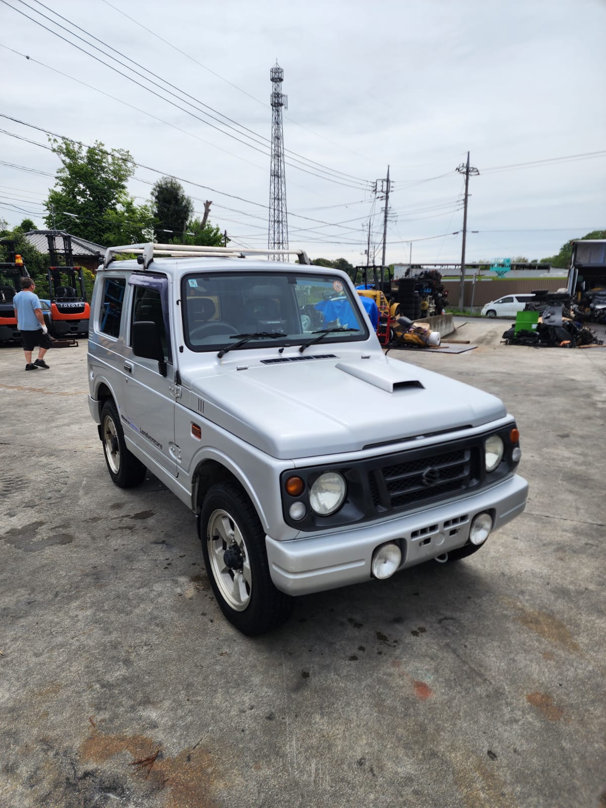 Silver 1998 Suzuki Jimny 4x4 kei SUV, photo 1 of 20