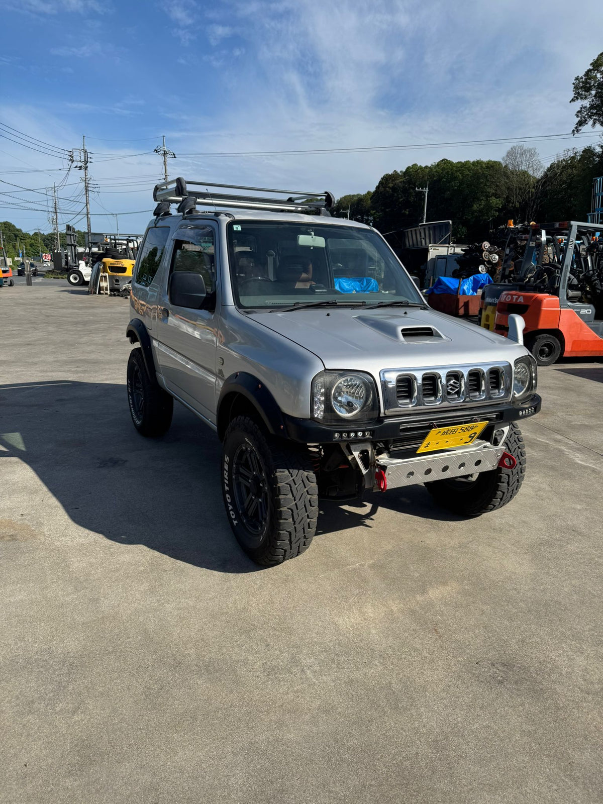 Silver 1998 Suzuki Jimny 4x4 kei SUV, photo 2 of 17