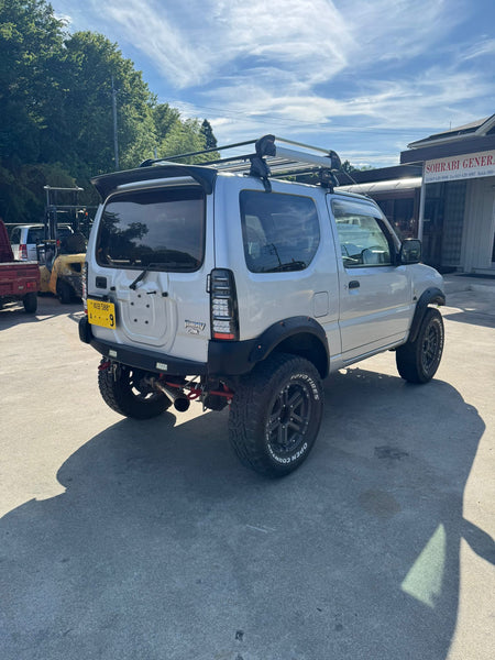 Silver 1998 Suzuki Jimny 4x4 kei SUV, photo 4 of 17