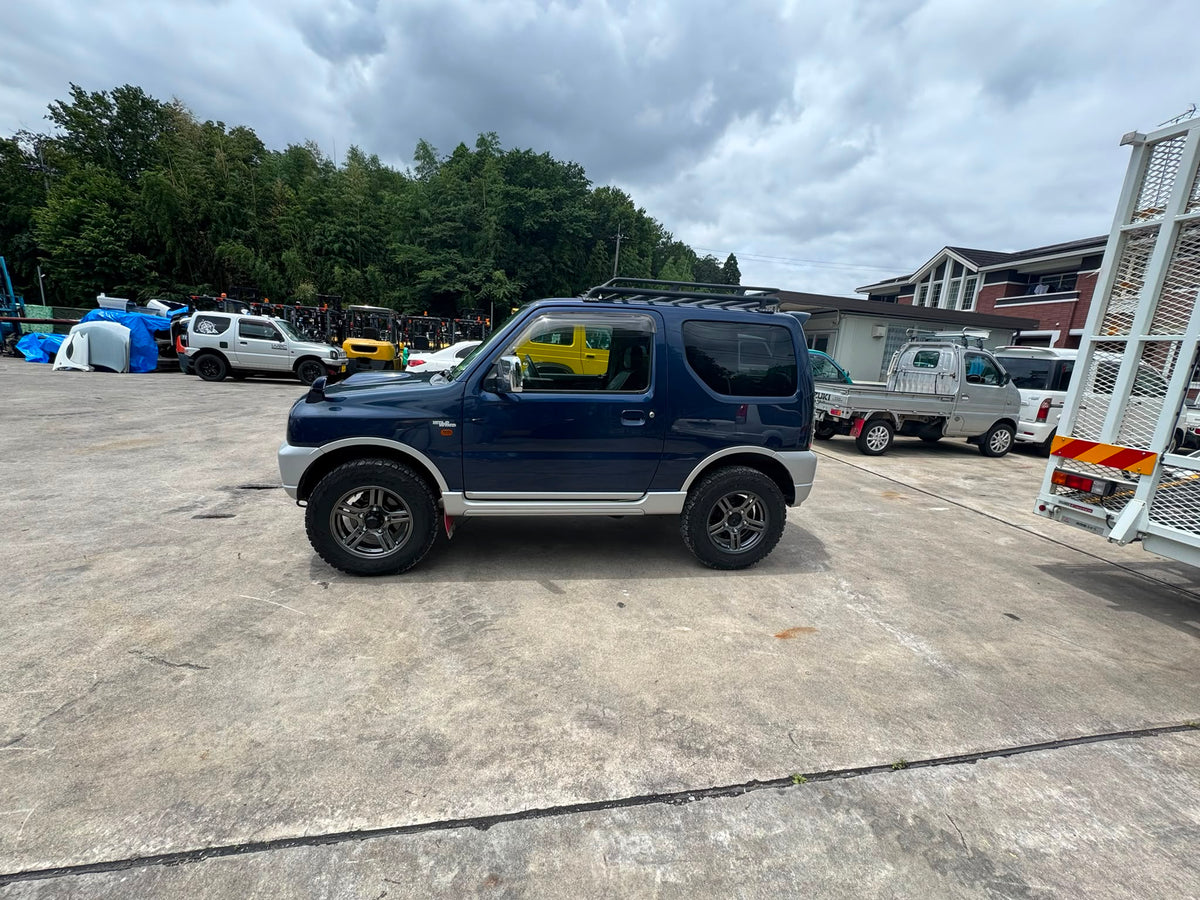 Blue/Silver 2000 Suzuki Jimny 4x4 kei SUV, photo 2 of 16