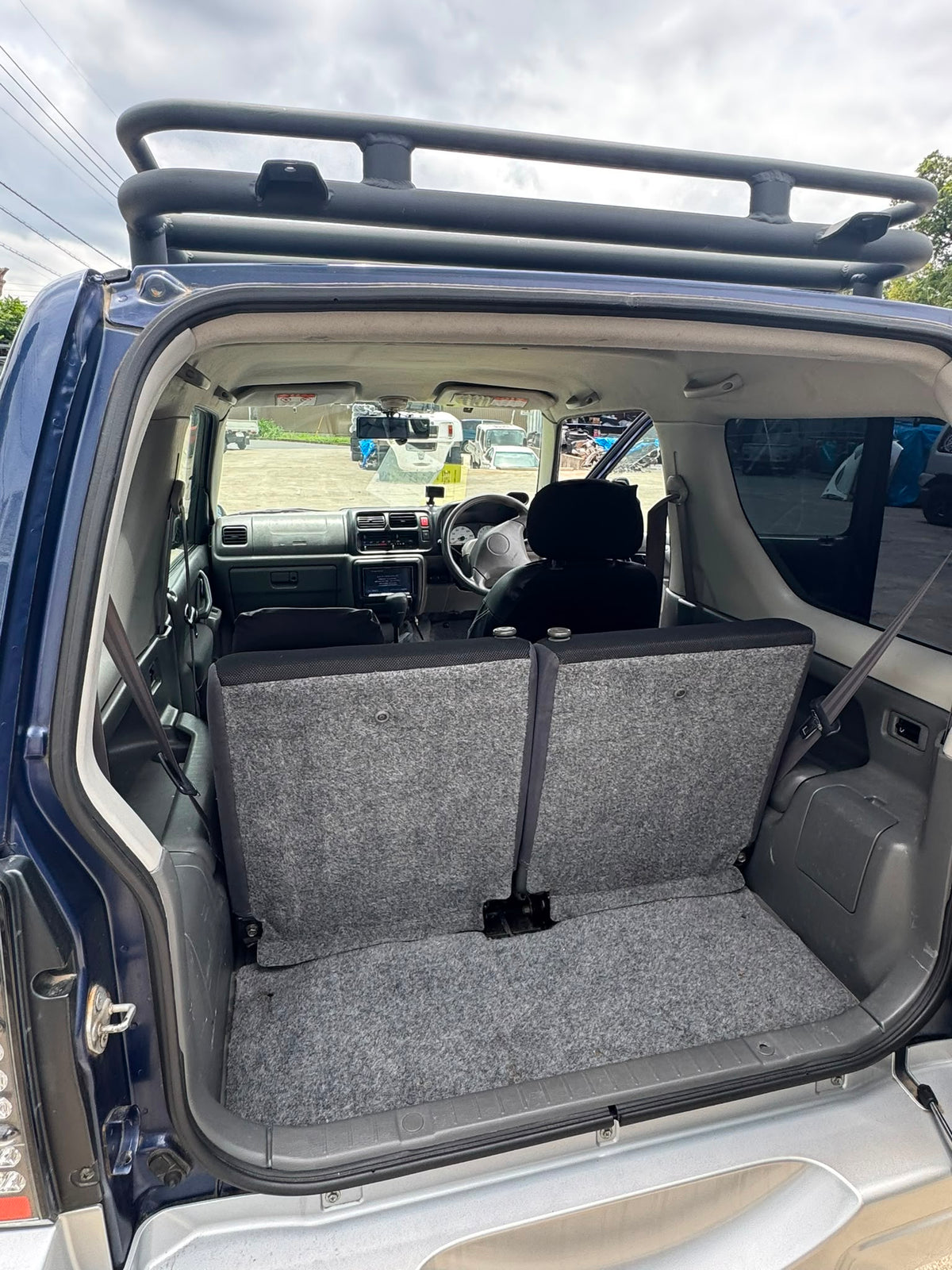 Blue/Silver 2000 Suzuki Jimny 4x4 kei SUV, photo 13 of 16