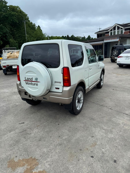 White 2001 Suzuki Jimny 4x4 kei SUV, photo 1 of 15