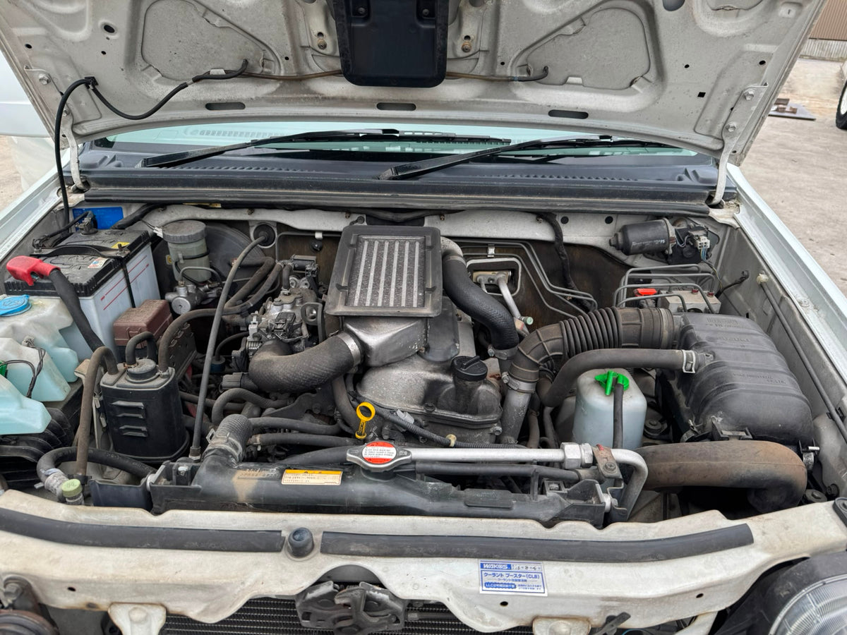 White 2001 Suzuki Jimny 4x4 kei SUV, photo 13 of 15