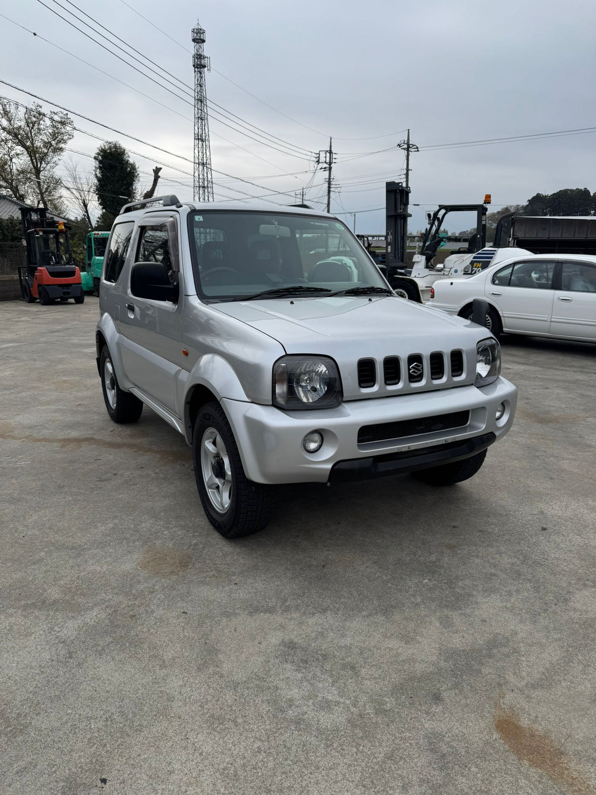 Silver 2001 Suzuki Jimny Wide 4x4 SUV, photo 1 of 14