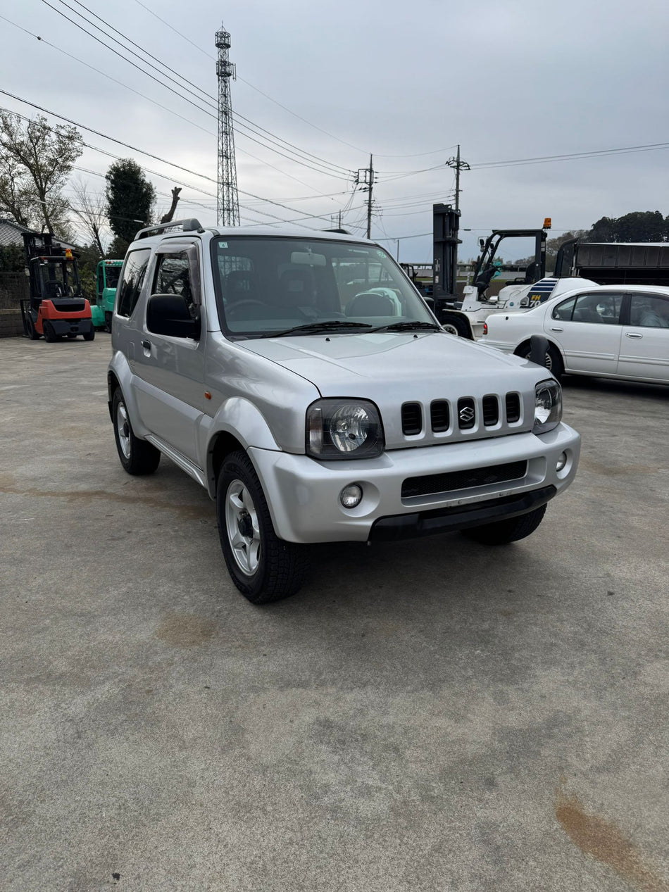 Silver 2001 Suzuki Jimny Wide 4x4 SUV, photo 1 of 14