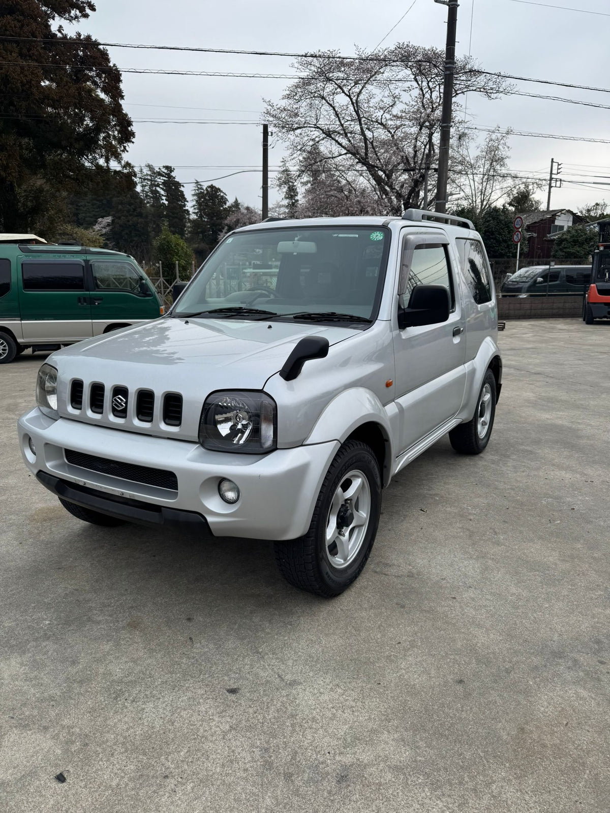 Silver 2001 Suzuki Jimny Wide 4x4 SUV, photo 2 of 14