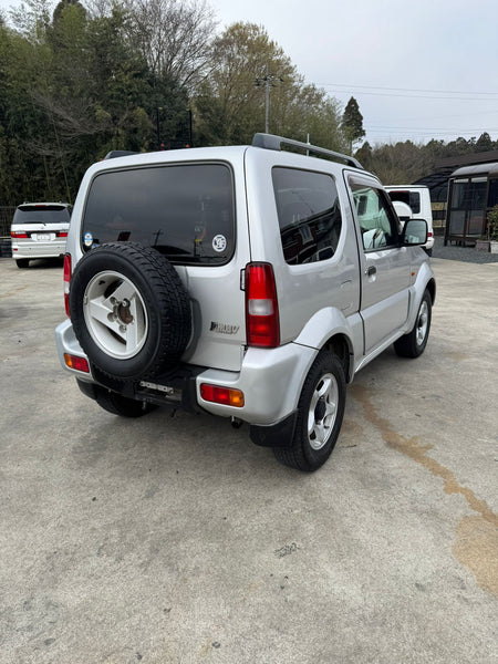 Silver 2001 Suzuki Jimny Wide 4x4 SUV, photo 4 of 14
