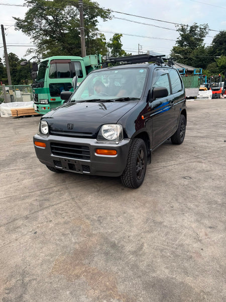 Black 1999 Honda Z 4WD kei SUV, photo 1 of 17