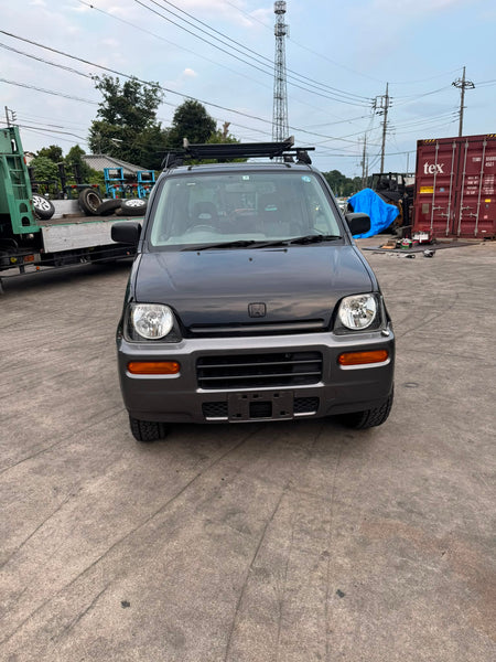 Black 1999 Honda Z 4WD kei SUV, photo 2 of 17
