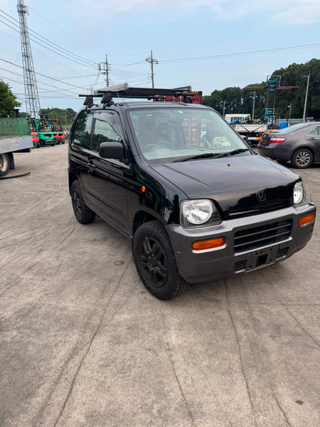 Black 1999 Honda Z 4WD kei SUV, photo 3 of 17