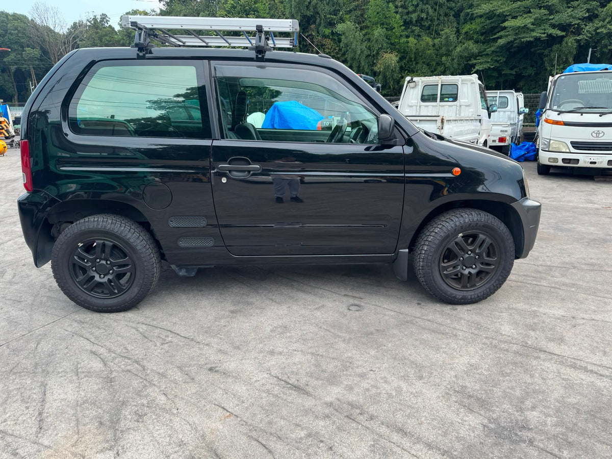 Black 1999 Honda Z 4WD kei SUV, photo 4 of 17