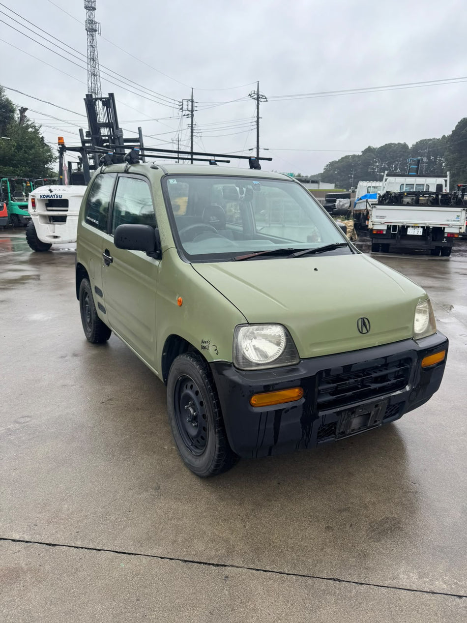 Green 1999 Honda Z Turbo 4WD kei SUV, photo 1 of 15