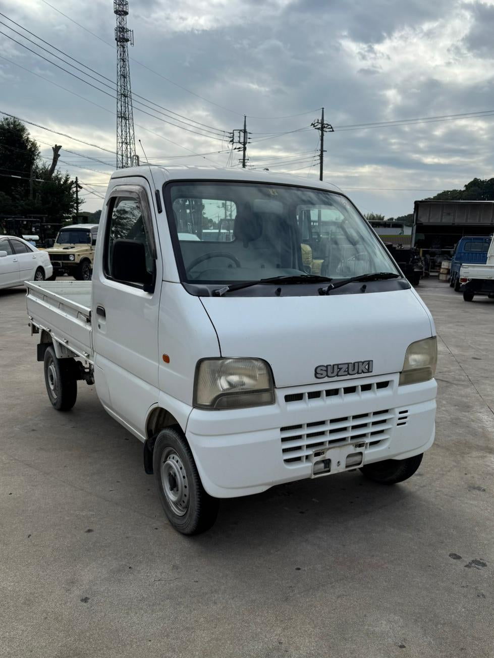 White 2001 Suzuki Carry 4x4 kei truck, photo 1 of 7