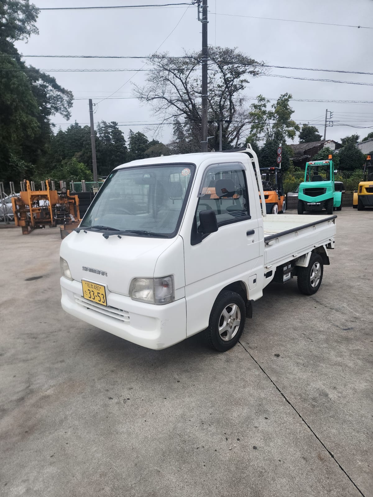 White 2001 Subaru Sambar 4x4 kei truck, photo 1 of 11