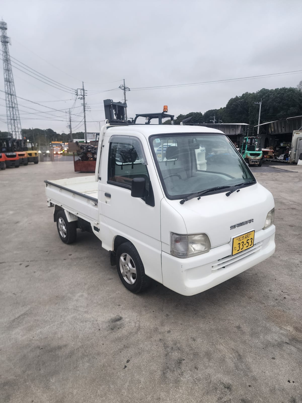 White 2001 Subaru Sambar 4x4 kei truck, photo 2 of 11