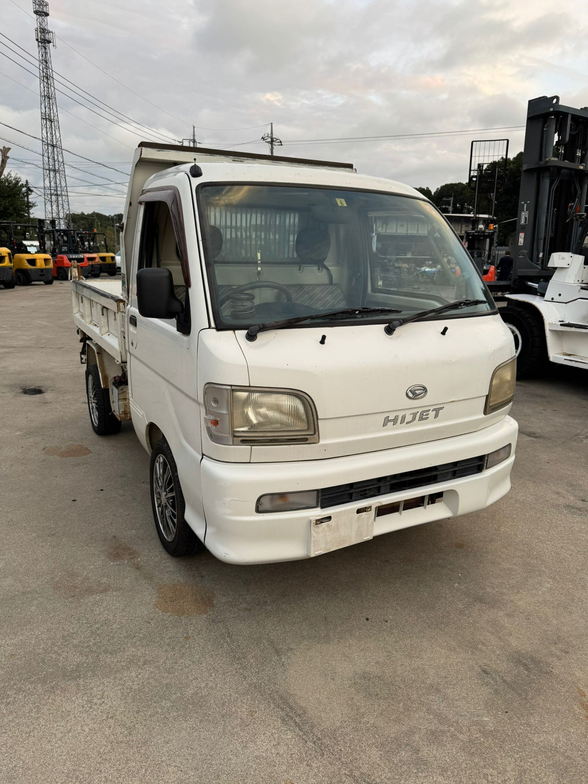 White 2001 Daihatsu Hijet 4x4 kei truck, photo 1 of 9