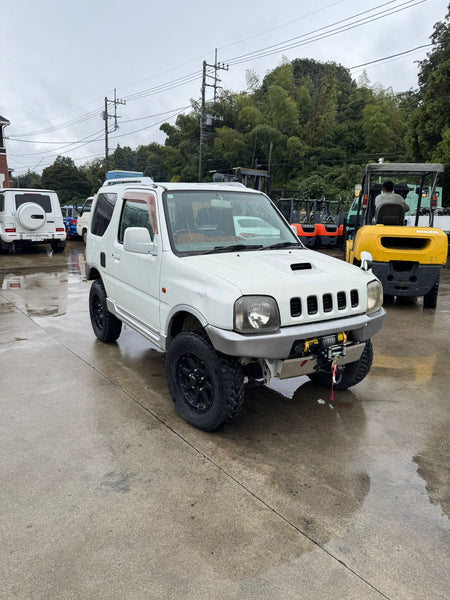 White 2001 Suzuki Jimny 4x4 kei SUV, photo 1 of 11