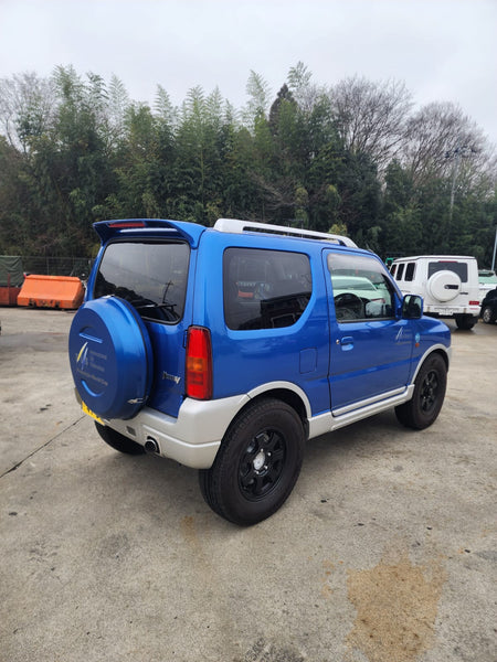 Blue/Silver 2001 Suzuki Jimny 4x4 kei SUV, photo 4 of 11