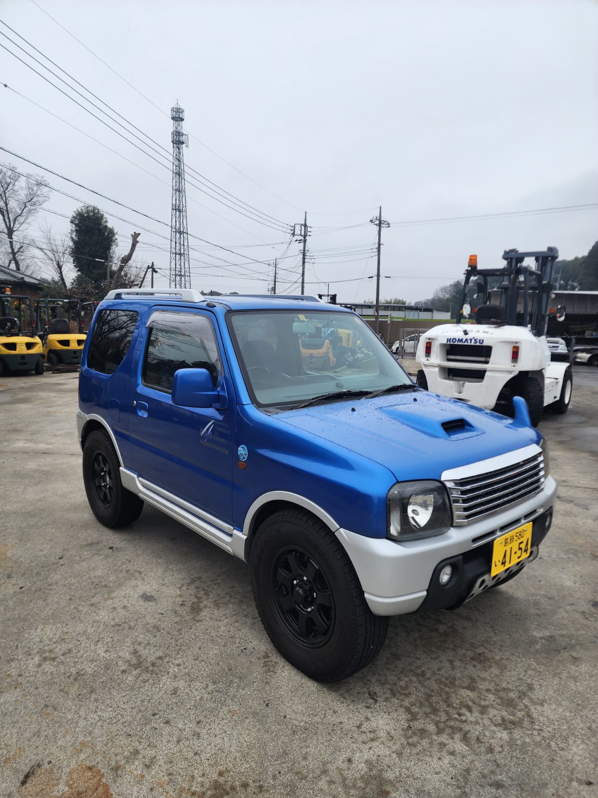 Blue/Silver 2001 Suzuki Jimny 4x4 kei SUV, photo 1 of 11
