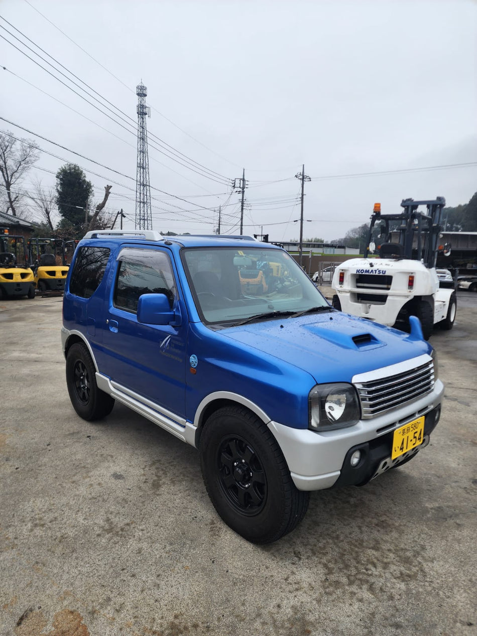 Blue/Silver 2001 Suzuki Jimny 4x4 kei SUV, photo 1 of 11