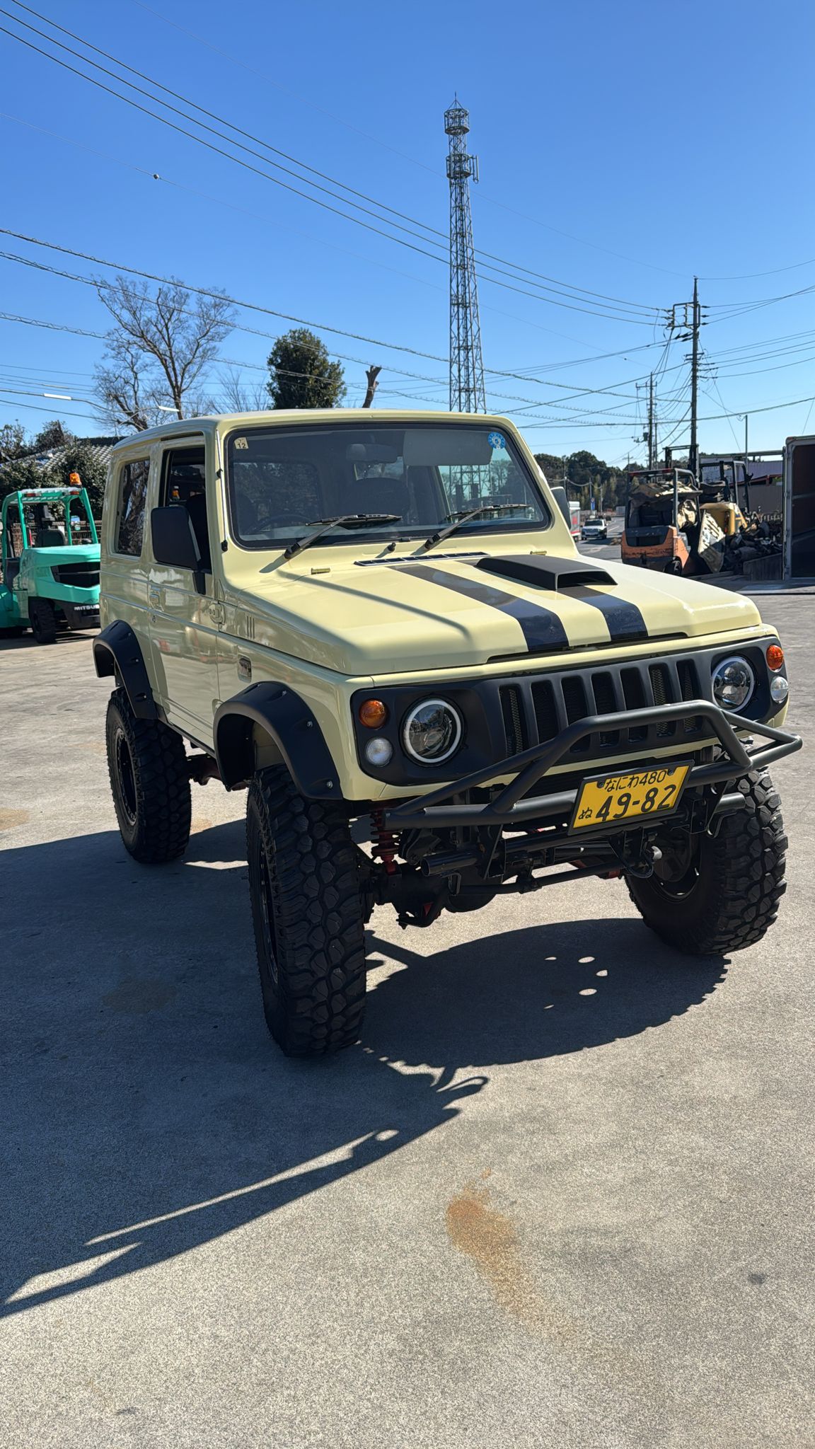Yellow 1998 Suzuki Jimny kei SUV, photo 2 of 17