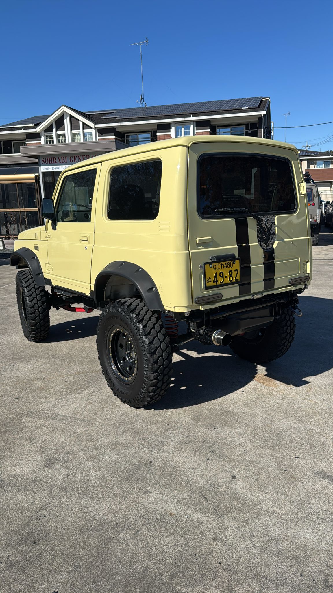 Yellow 1998 Suzuki Jimny kei SUV, photo 4 of 17
