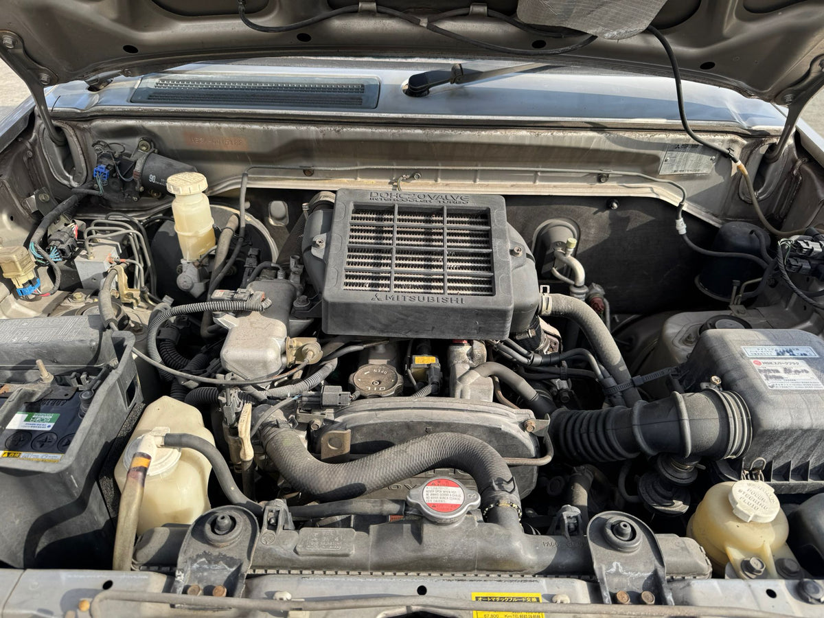 Silver 1999 Mitsubishi Pajero Mini 4x4 kei SUV, photo 8 of 11