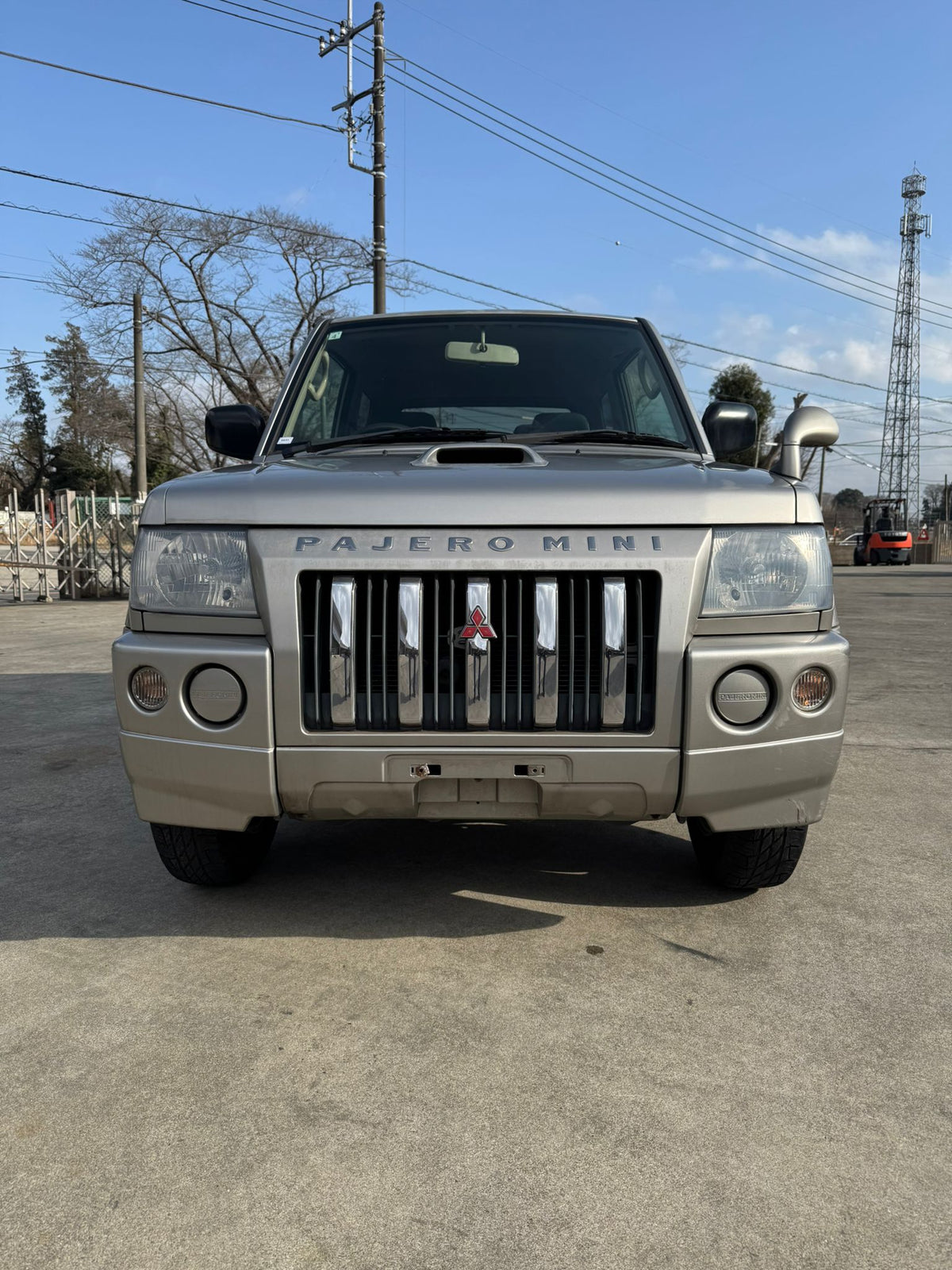 Silver 1999 Mitsubishi Pajero Mini 4x4 kei SUV, photo 2 of 11