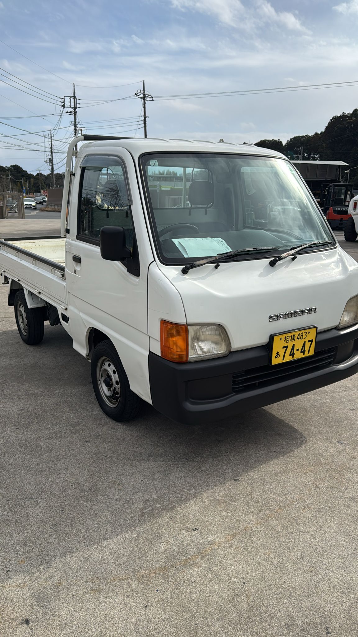 White 2000 Subaru Sambar 4x4 kei truck, photo 1 of 9