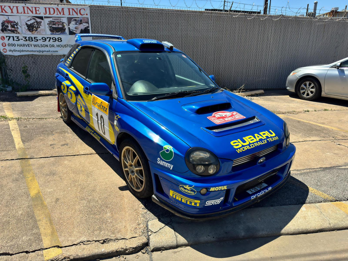 Blue 2001 Subaru WRX STI, photo 2 of 15