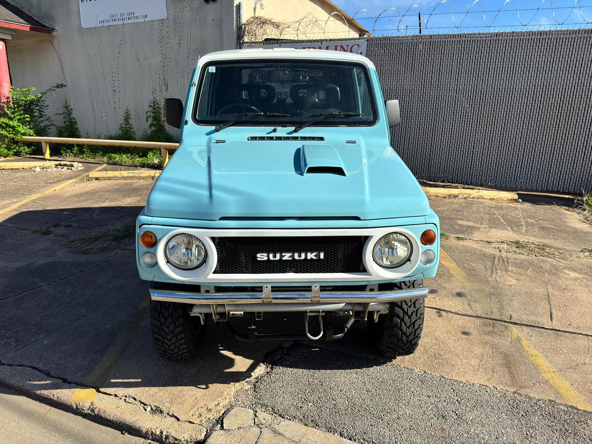 Blue/White 1996 Suzuki Jimny kei SUV, photo 2 of 15