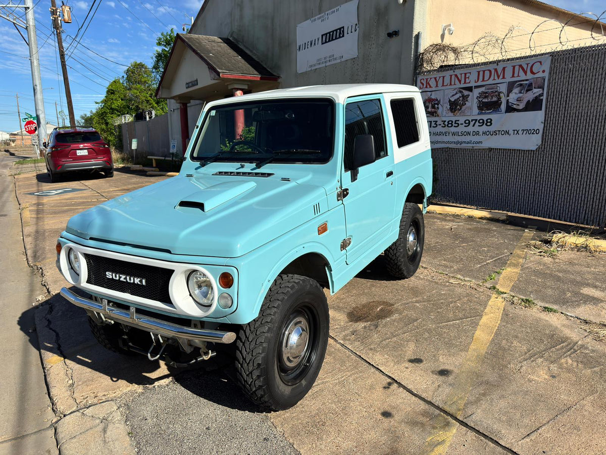Blue/White 1996 Suzuki Jimny kei SUV, photo 1 of 15