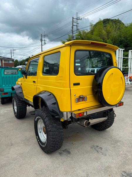 Yellow 1997 Suzuki Jimny Sierra 4x4 kei SUV, photo 3 of 14