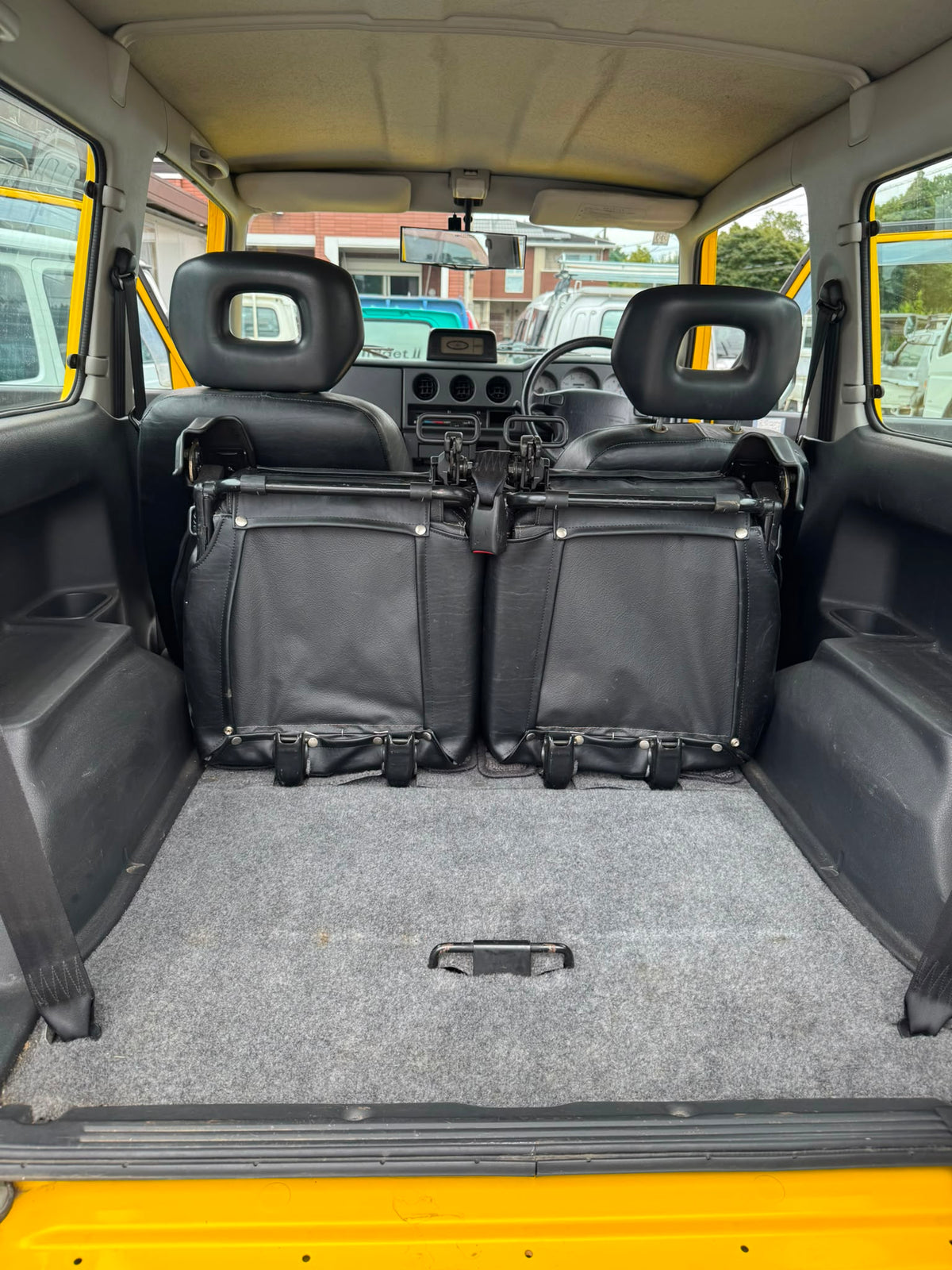 Yellow 1997 Suzuki Jimny Sierra 4x4 kei SUV, photo 11 of 14