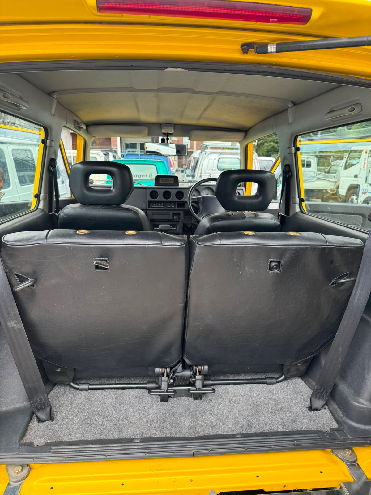 Yellow 1997 Suzuki Jimny Sierra 4x4 kei SUV, photo 10 of 14