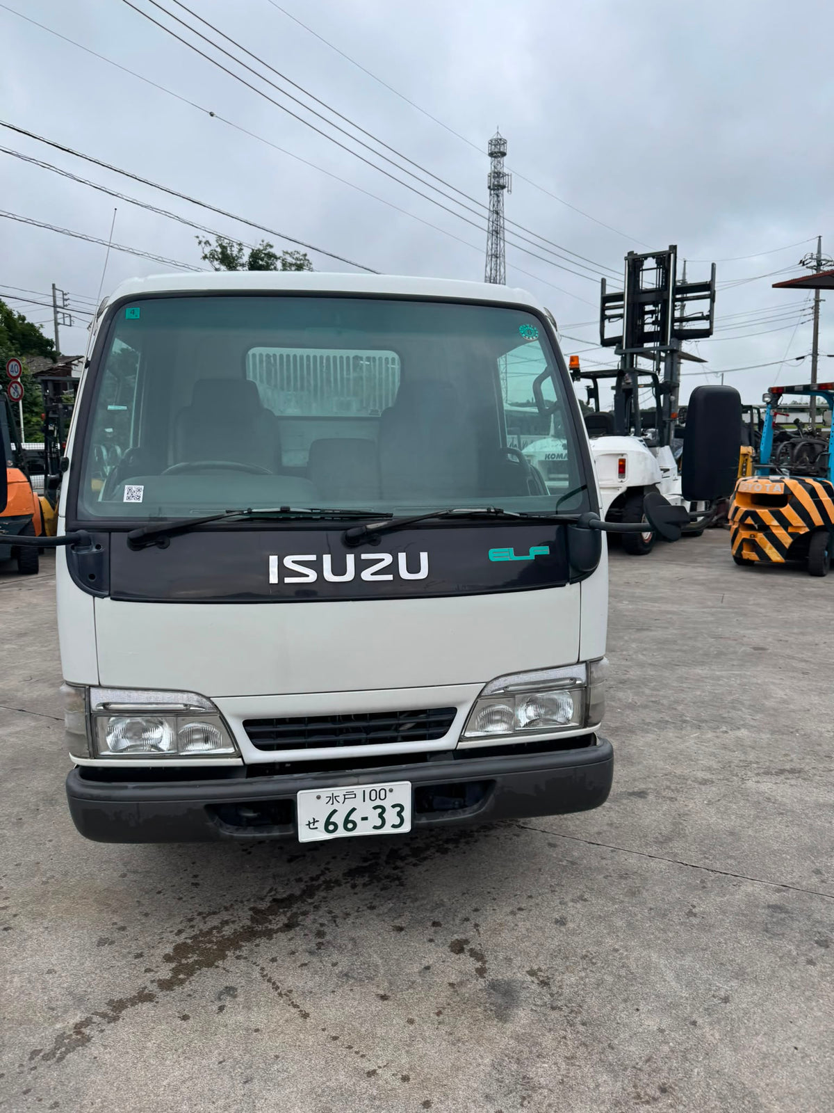 White 1998 Isuzu Elf Diesel Dump Truck 4x2, photo 2 of 14