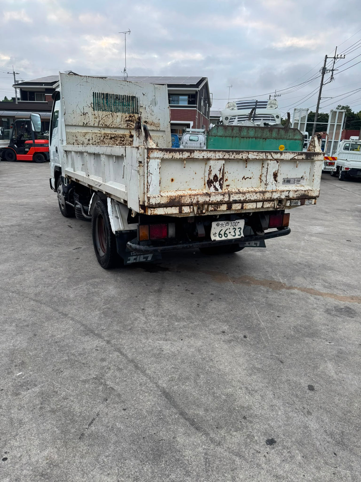 White 1998 Isuzu Elf Diesel Dump Truck 4x2, photo 5 of 14