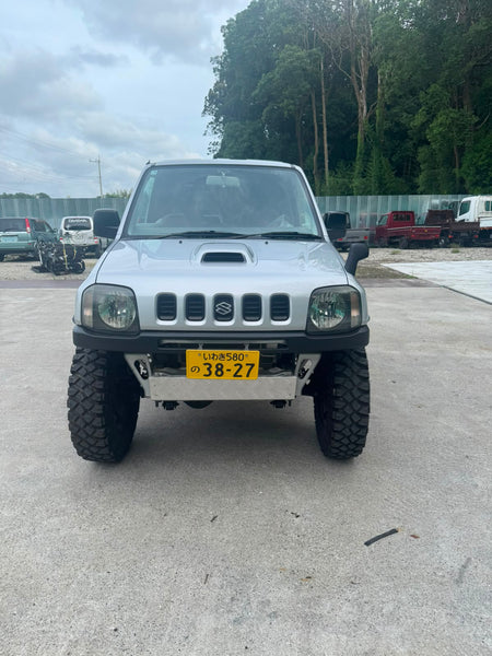Silver 2000 Suzuki Jimny 4x4 kei SUV, photo 2 of 10