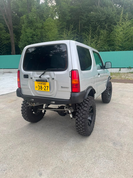 Silver 2000 Suzuki Jimny 4x4 kei SUV, photo 6 of 10