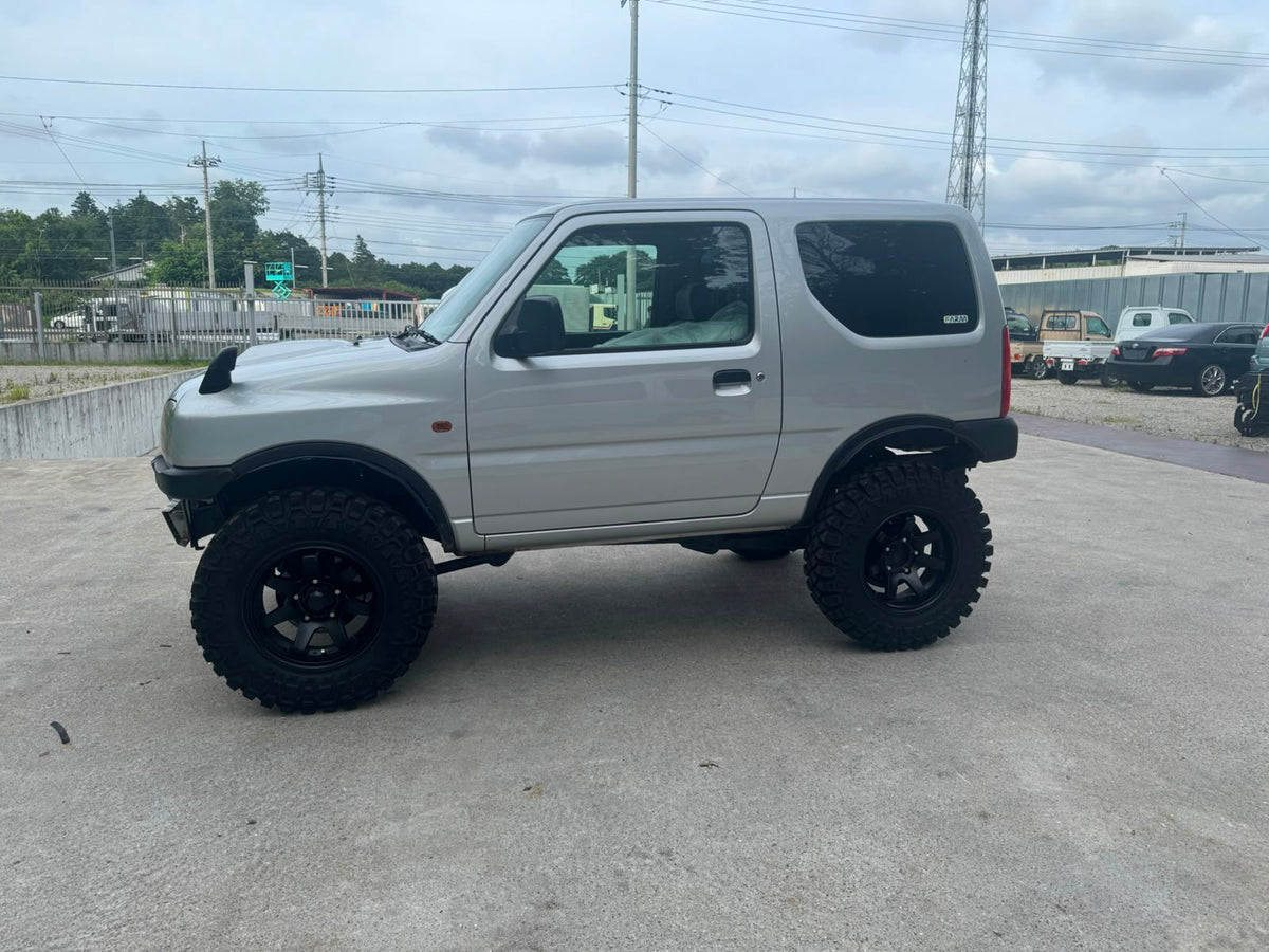 Silver 2000 Suzuki Jimny 4x4 kei SUV, photo 4 of 10