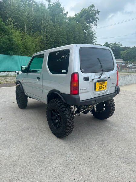 Silver 2000 Suzuki Jimny 4x4 kei SUV, photo 5 of 10