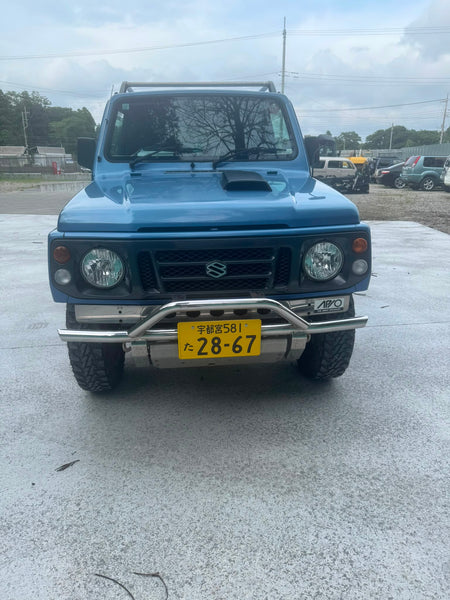 Blue 1997 Suzuki Jimny 4x4 kei SUV, photo 2 of 9