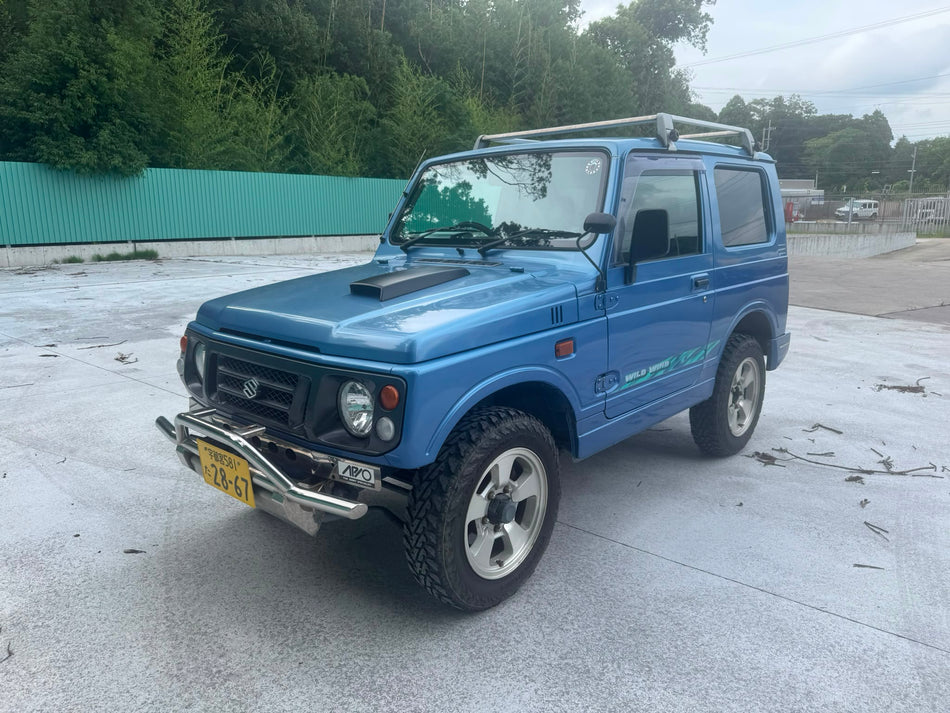 Blue 1997 Suzuki Jimny 4x4 kei SUV