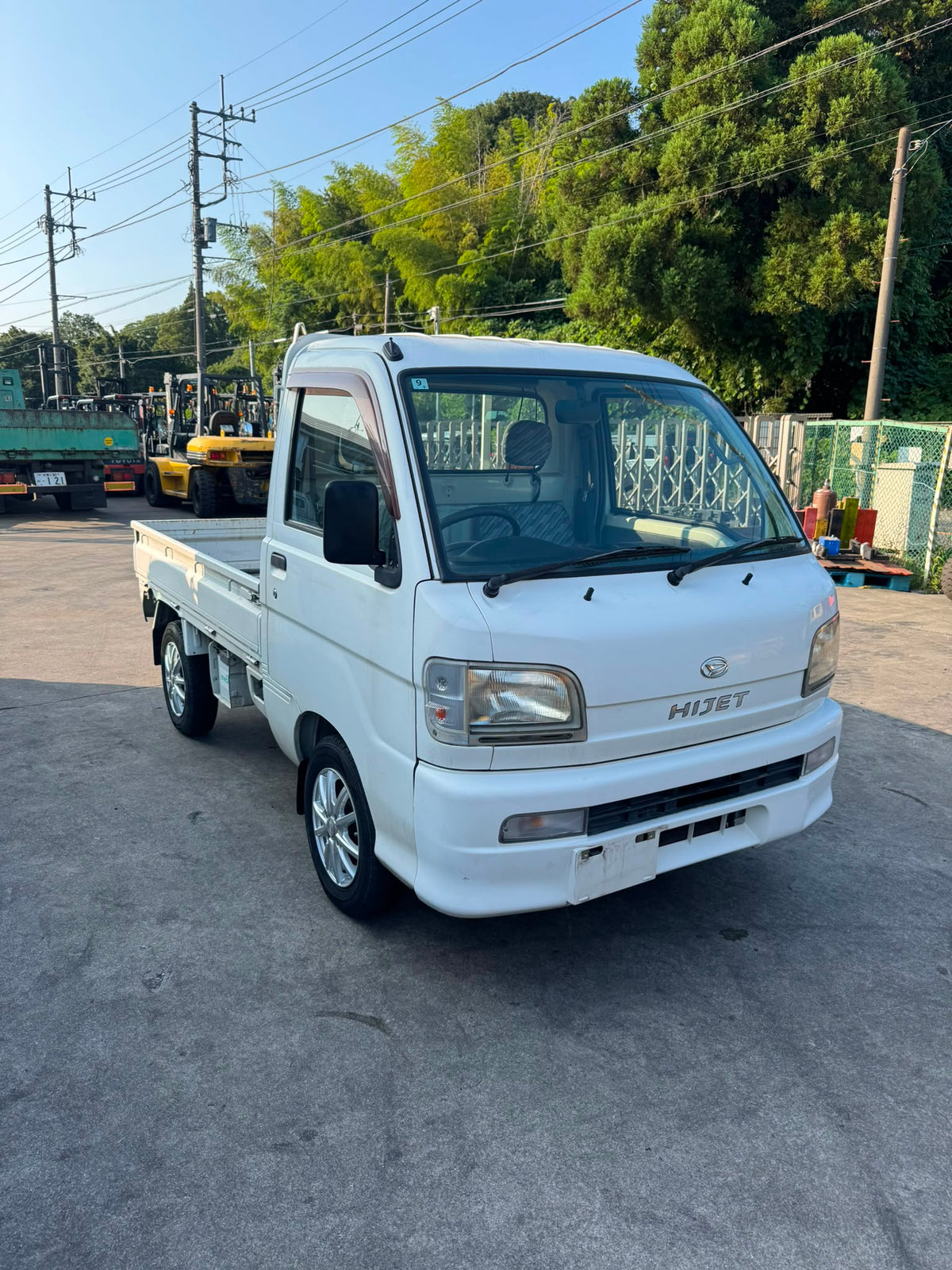 White 2001 Daihatsu Hijet 4x4 kei truck, photo 1 of 10